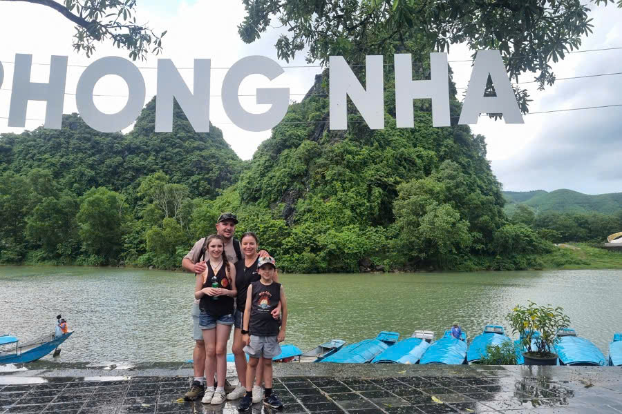 Guests cruising on the Son River in Phong Nha National Park during an all inclusive Central Vietnam tour