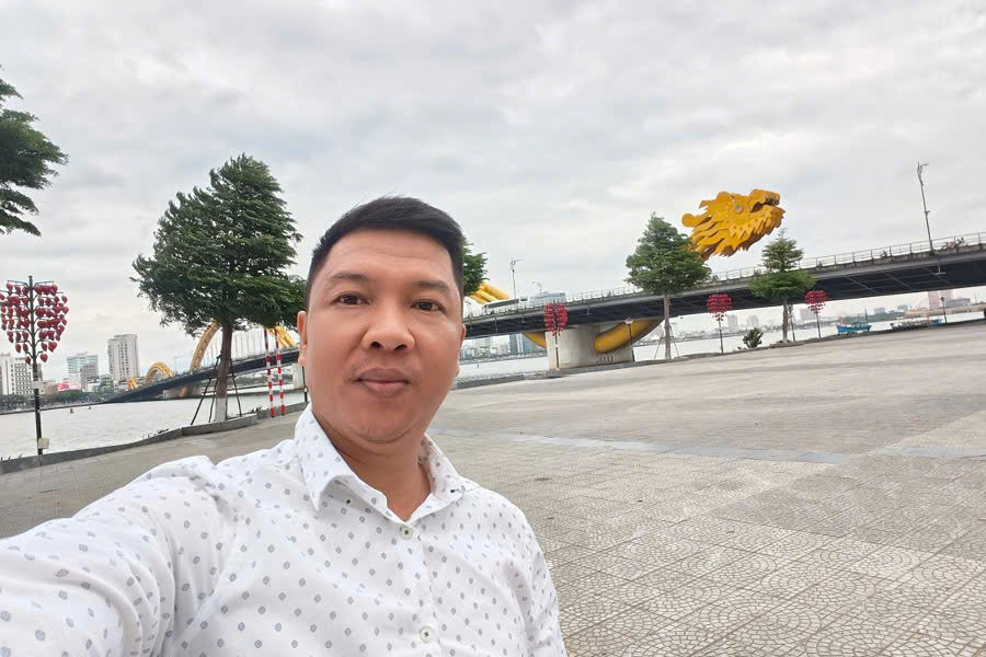 Mr. Viet Nguyen at Dragon Bridge in Da Nang during a custom Vietnam itinerary
