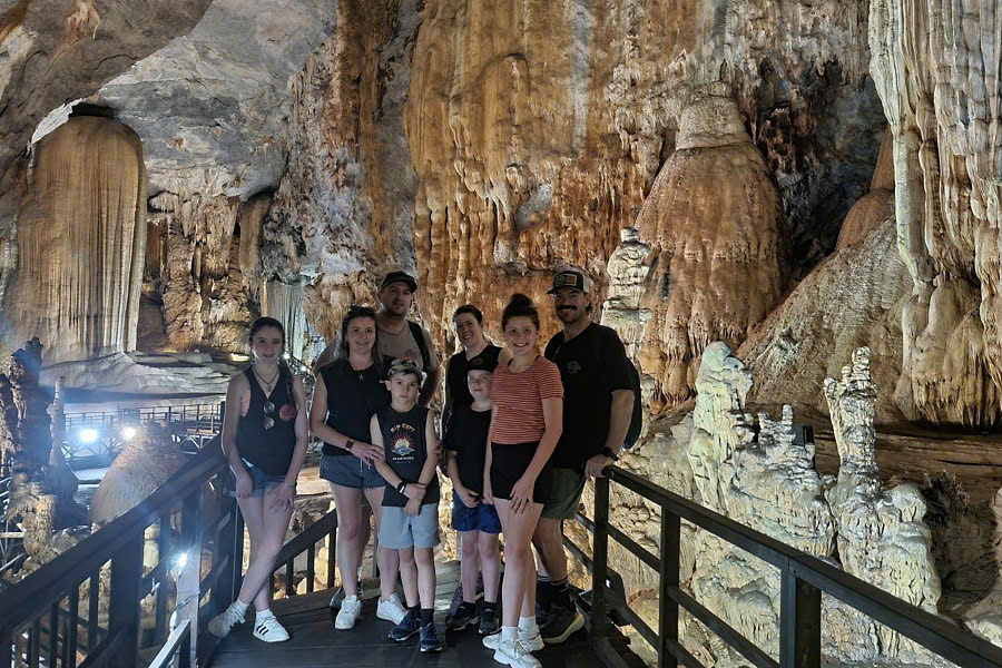 Guests exploring Paradise Cave in Phong Nha–Ke Bang National Park during a Vietnam travel package