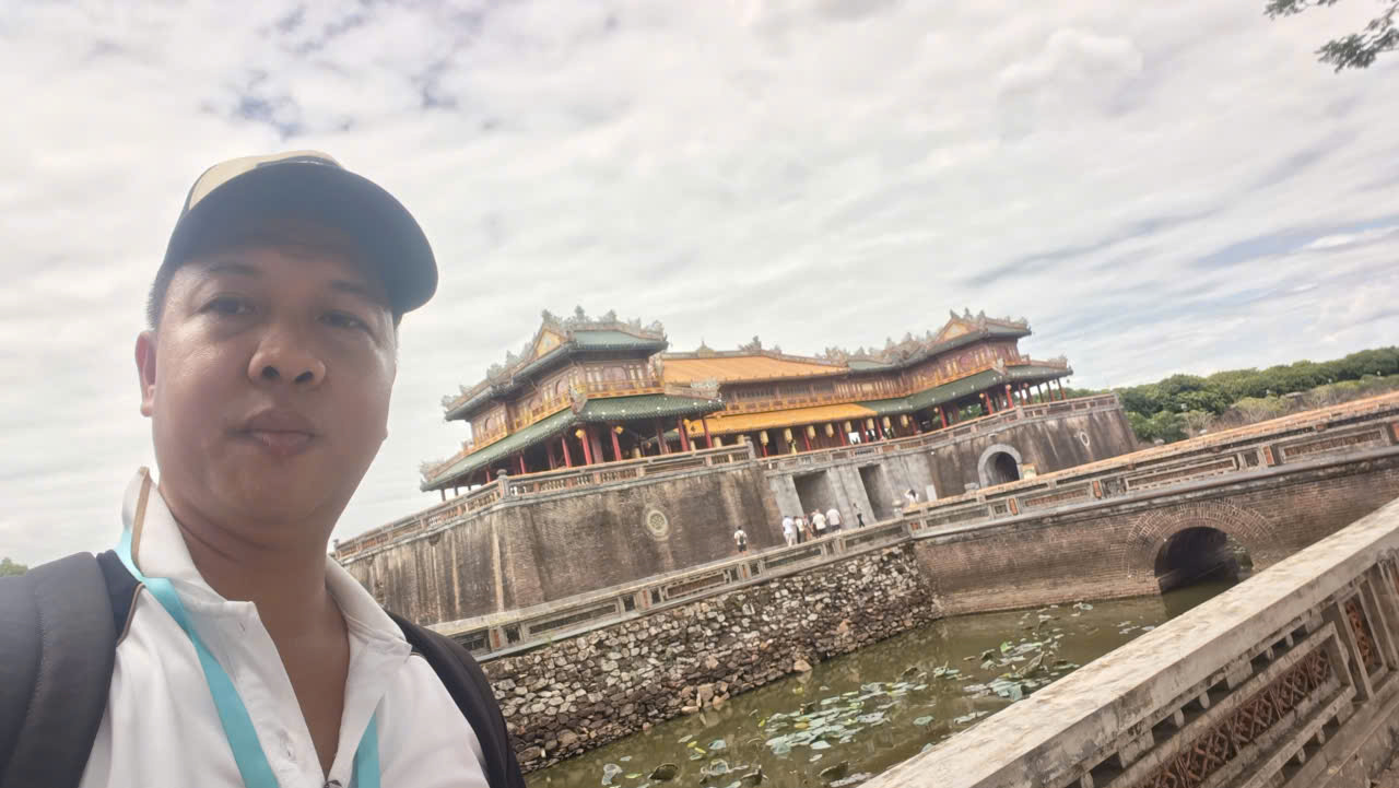 Viet Nguyen taking a selfie at the Hue Imperial City during a private Hue Day Tour from Da Nang, Vietnam.