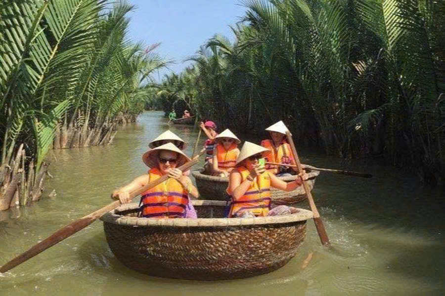 Tourists taking a basket boat ride in Cam Thanh Coconut Village, Hoi An