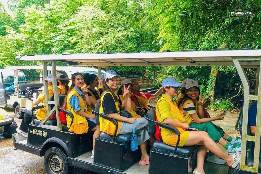 Electric buggy transfer on the path to Paradise Cave