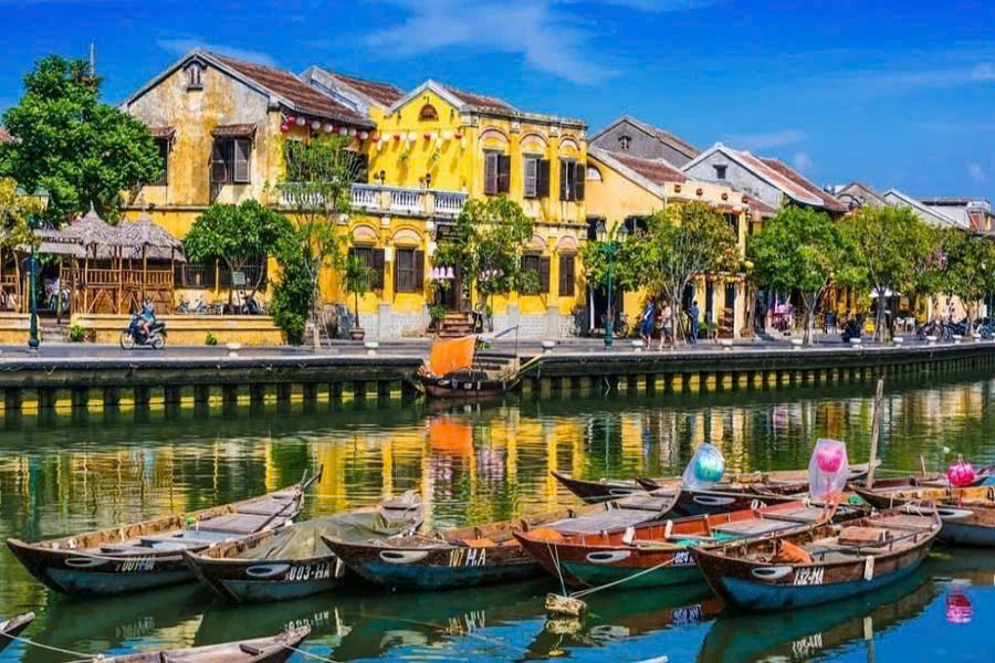 Yellow historic buildings and colorful lanterns in Hoi An Ancient Town Vietnam